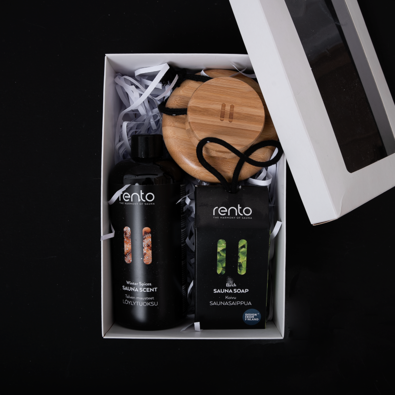 Lahjasetti lahjapakkauksessa WINTER SPICES. Tuoksuesanssi, vartaloharja ja saippua.