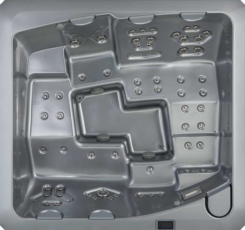 Ylhäältä päin harmaa USSPA-kylpyallas, jossa on ergonomiset istuimet ja useita suihkualueita